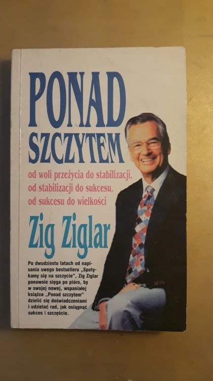 7741325996
